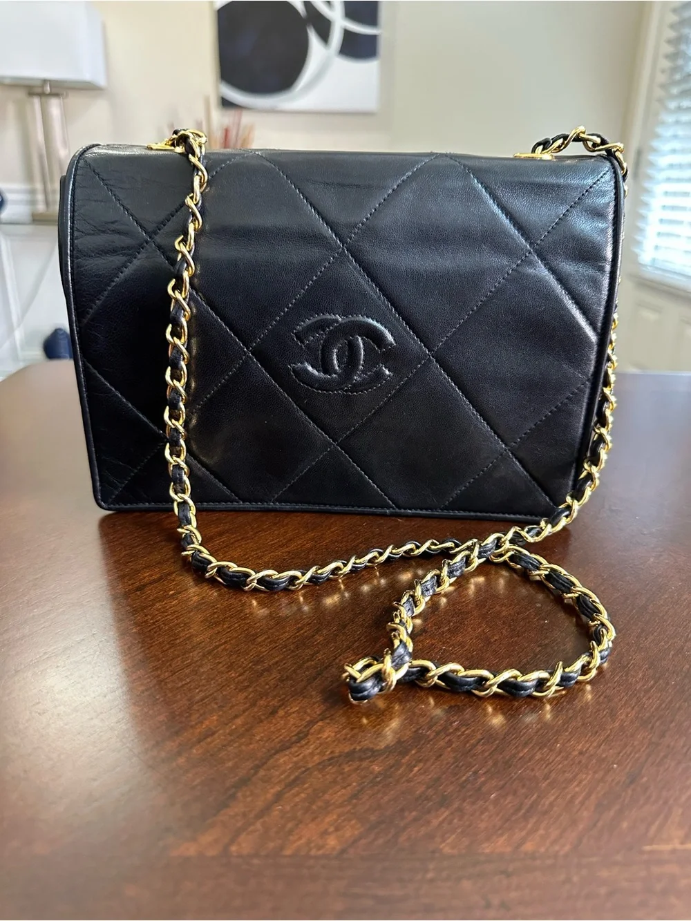 CHANEL Black Quilted Lambskin Shoulder Bag with Gold Chain Detail